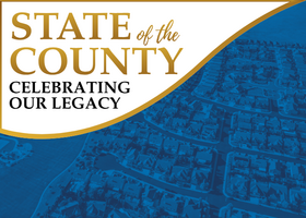 Blue-toned aerial image of many homes in a Roseville neighborhood with white space and text: State of the County celebrating our legacy