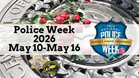 A memorial with a National Police Week Logo and text saying National Police Week is May 10-16