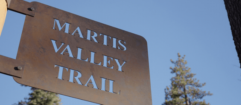 Two images on Martis Valley Trail at Northstar Village with text inviting you to join the ribbon cutting June 3