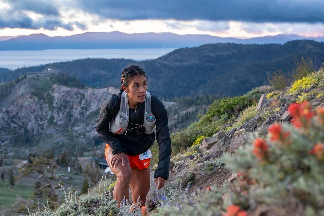 Western States Endurance Run competitor Jennifer Lichter climbs a trail out of Olympic Valley.