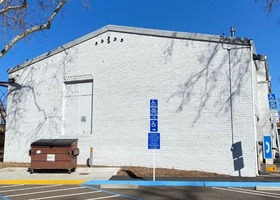 The blank exterior wall of the Roseville Veterans Hall
