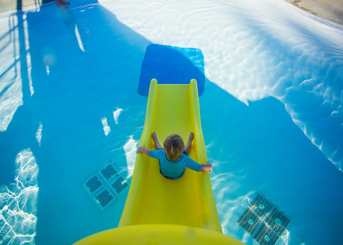 Child on a waterslide
