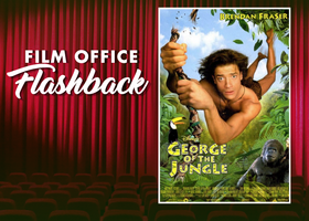 ed curtain background and white text: Film Office Flashback and a cover of the 1997 film George of the Jungle with Brendan Fraser swinging on a vine.