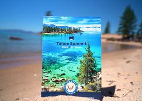 The 30th annual Tahoe Summit brochure in white sand and the bright blue waters of Lake Tahoe.