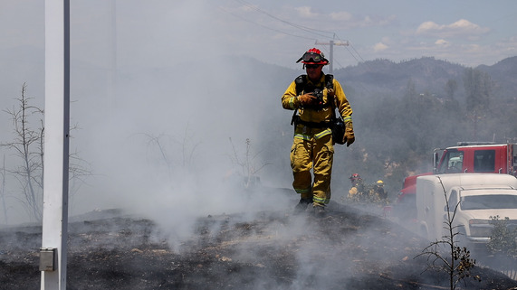 Redding Fire Department on Roadside Fire 
