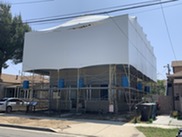 Harada House scaffolding and tarp