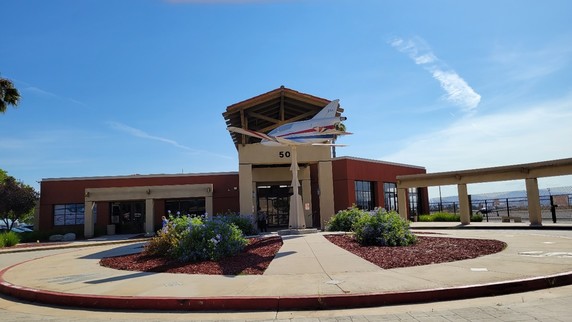 The roundabout in front of the French Valley Airport terminal. There is a large fake plane in the middle of the roundabout.