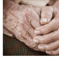 Elderly person crossing hands