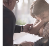 Man consoling girl
