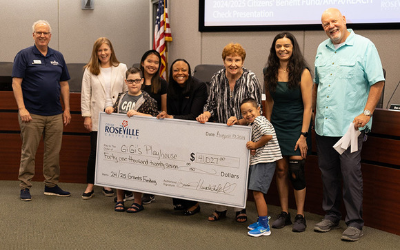 Photo of Roseville City Council members awarding the Citizens' Benefit Fund check to Gigi's Playhouse