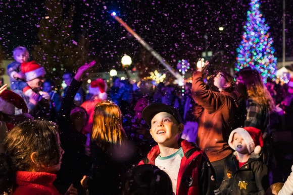 Photo of kids smiling during the Downtown Holiday Celebration
