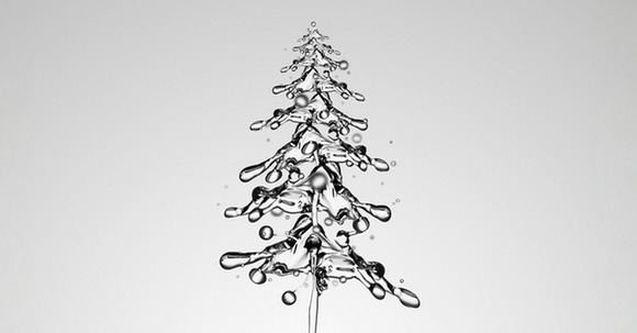Photo of water drizzle in the shape of the Christmas tree