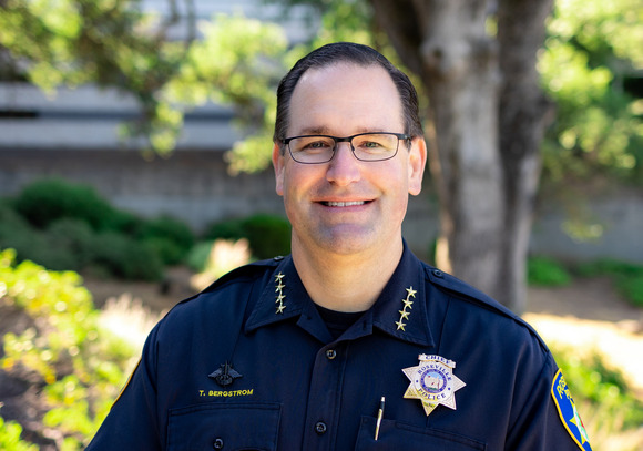 Headshot-style photo of Chief Troy Bergstrom smiling