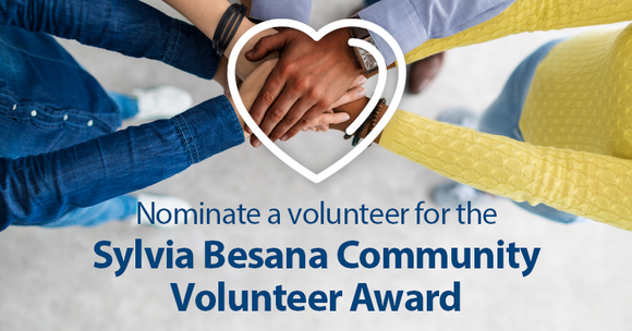 Hands together with a heart