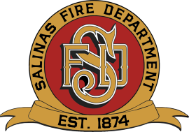 red circle with gold ribbon that says Salinas Fire Department Est. 1874