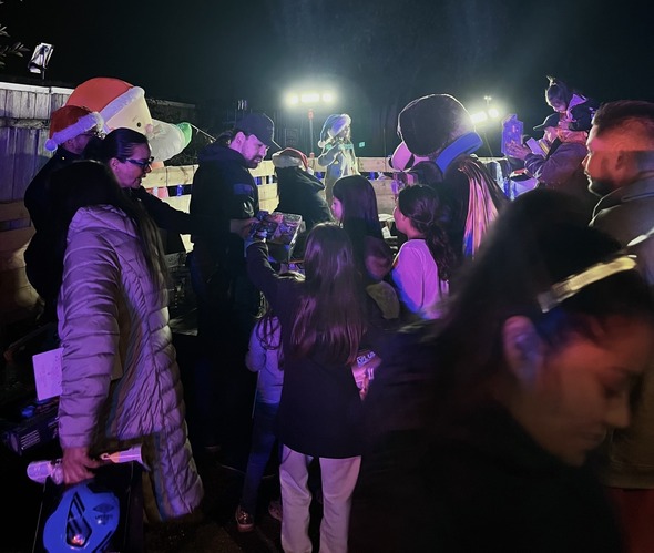 Salinas PD passing out toys to children.