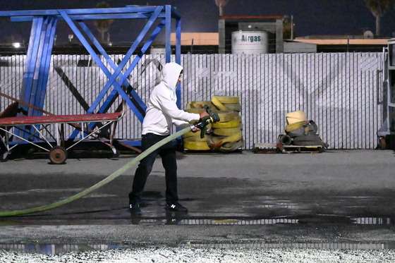 youth-using-fire-hose