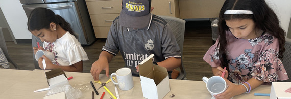 Kids designing their own mugs