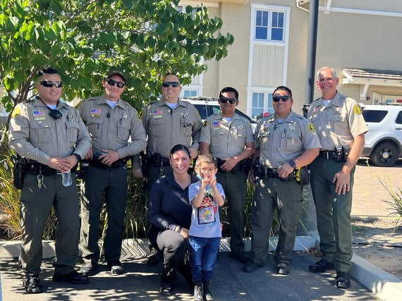 Members of the San Bernardino County Sheriff’s Department visit Ronald McDonald House in Loma Linda.