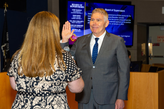 The new assessor recorder is sworn in after his appointment by the BOS.