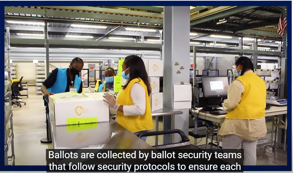 Ballot workers for the Registrar of Voters sort through ballot boxes.