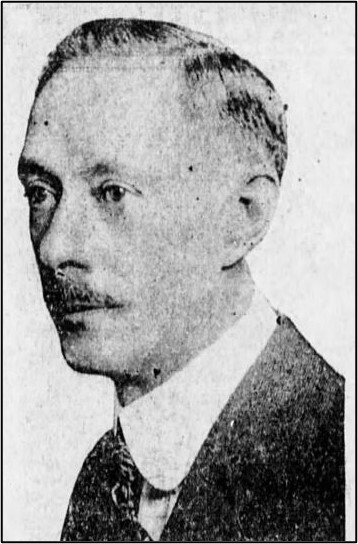 A black and white profile photo of Sheridan Berger as County Auditor in 1915.