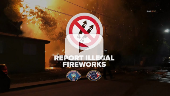 A photo of a house on fire at night.