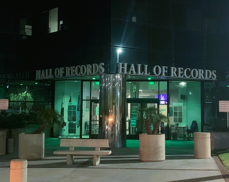 County illuminating  buildings green in support of veterans