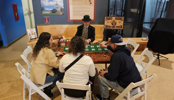 Old fashion dealer at poker table