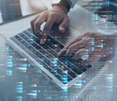 Icon image of hands on a keyboard