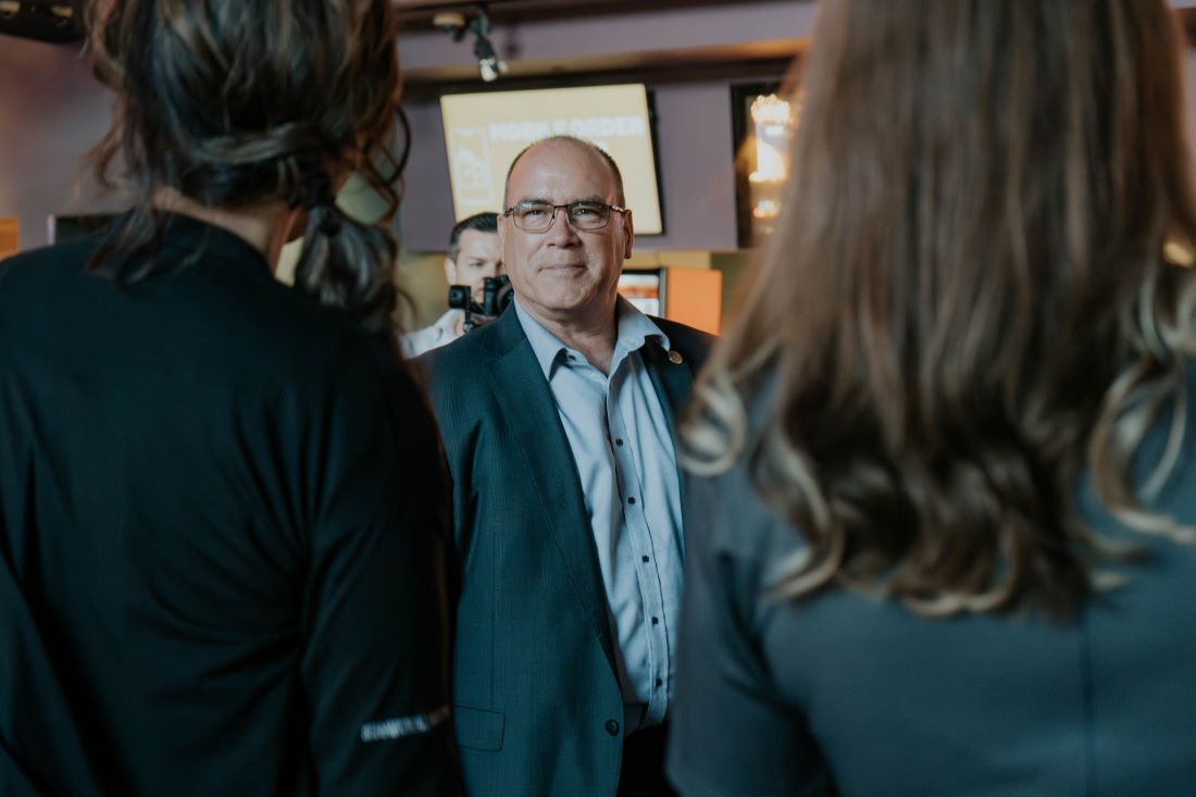 Supervisor Curt Hagman engaging in conversation with two individuals at the 2025 Reel Reality Fentanyl Awareness Red Carpet event.
