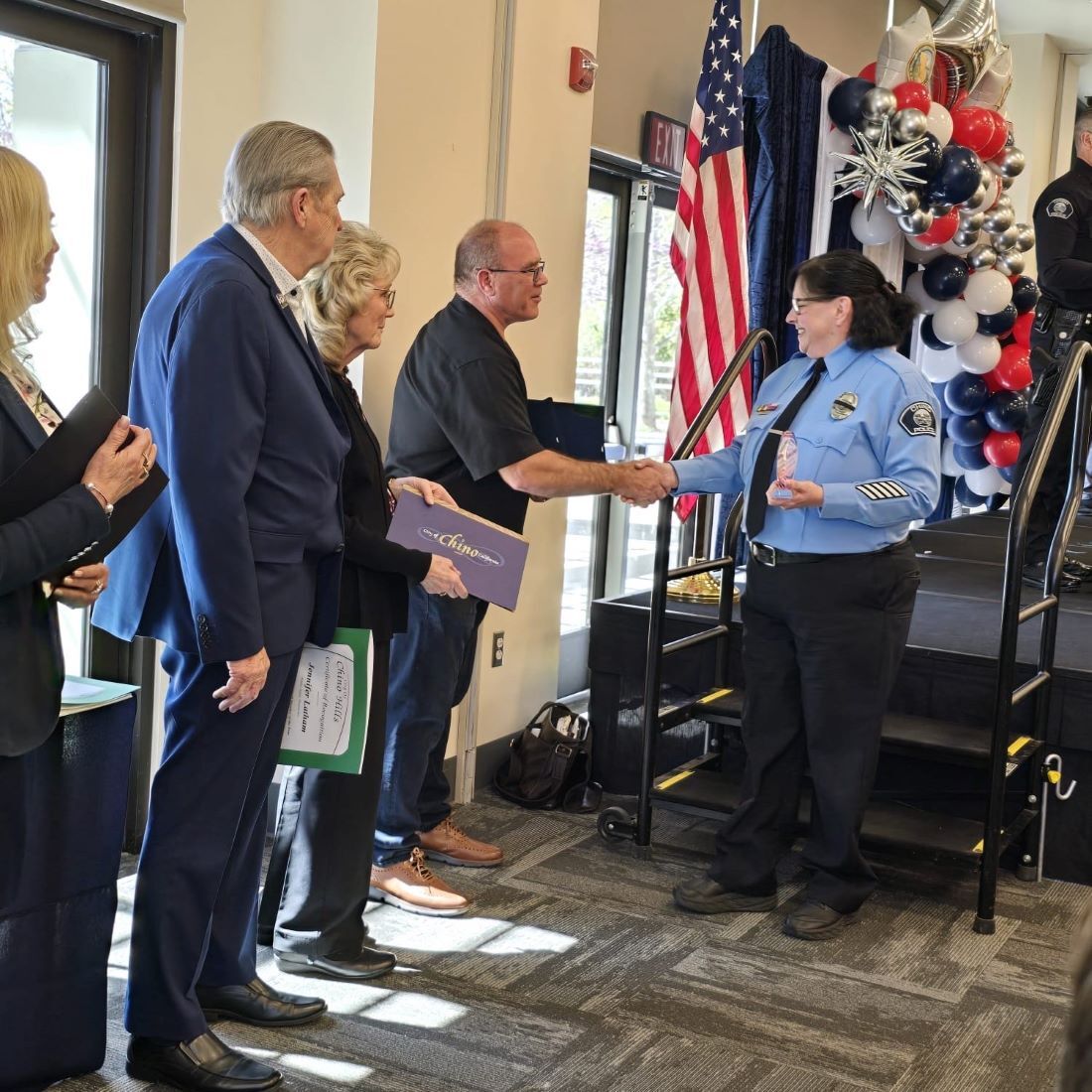 Supervisor Curt Hagman shaking hands with one of the recipients of the Salute to Public Safety event.