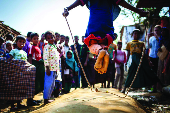 Free Play with String; Rohingya Children Waiting Their Turn, Cox Bazaar Refugee Camp, Bangladesh, 2018.