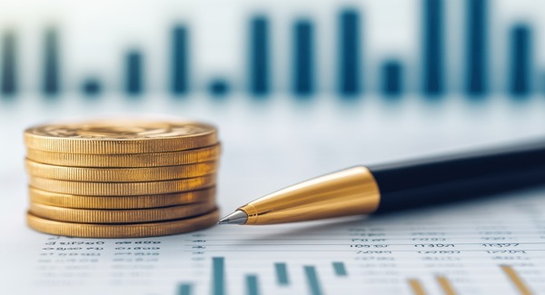 Photo illustration of coins and pen for careers in finance