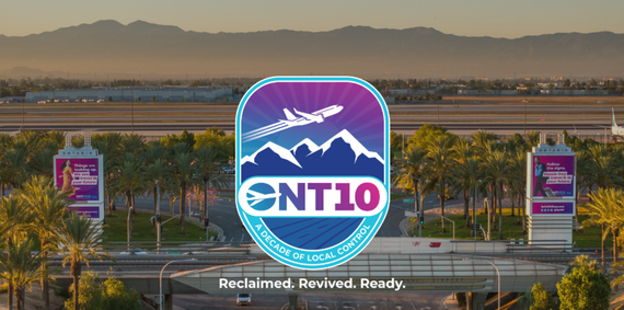 ONT10 anniversary logo over Ontario International Airport entrance with palm trees.