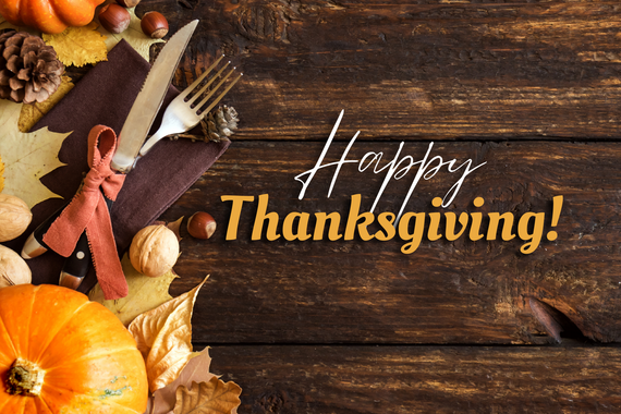 A thanksgiving graphic with fall leaves, pumpkin, and utensils beside the text saying, "Happy Thanksgiving."