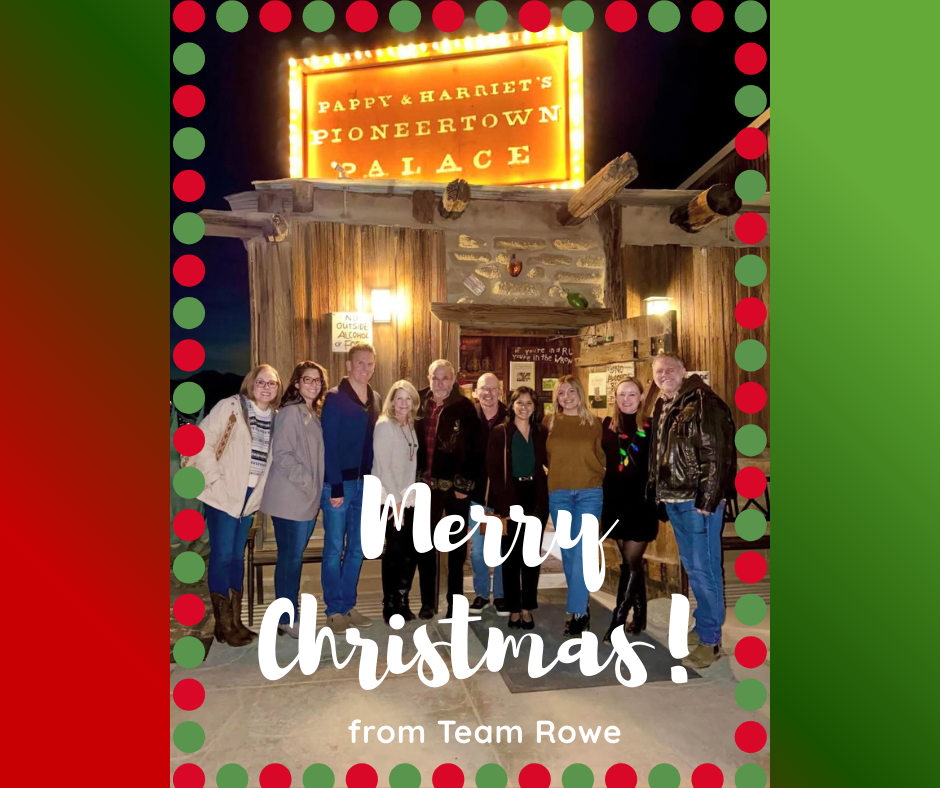 Dawn Rowe's staff stands outside of Pappy & Harriet's in Pioneertown, celebrating the holiday season