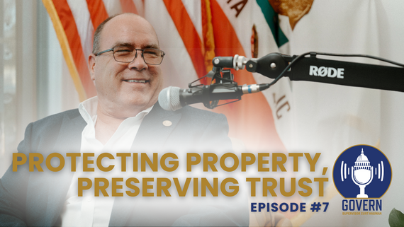 Man smiling at microphone during podcast titled Protecting Property, Preserving Trust.