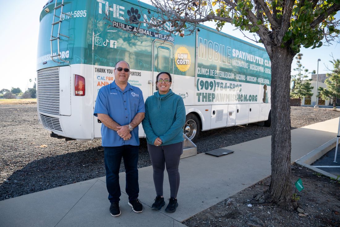 Supervisor Curt Hagman with PAW Mission staff in front of mobile spay and neuter clinic bus.
