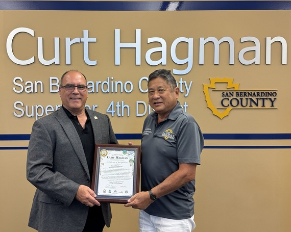 Supervisor Curt Hagman presents certificate to David Sakurai for 25 years of service on Equal Opportunity Commission.