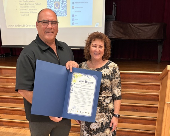 Supervisor Curt Hagman presents a certificate honoring the Upland Woman’s Club House for its 100th anniversary.