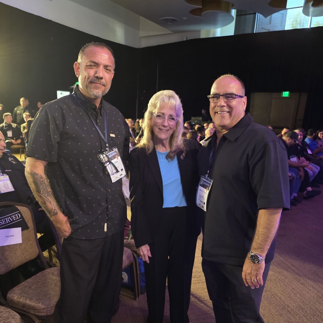 Supervisor Curt Hagman and Mayor Eunice Ulloa pose together at the 2026 Chino State of the City as attendees listen to the presentation.
