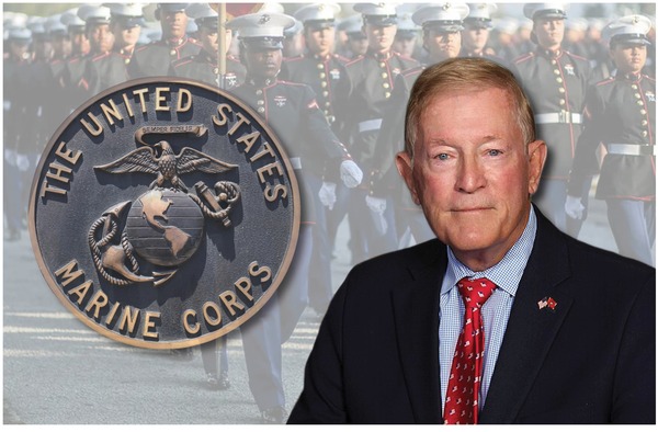 Cutout photo of County Supervisor Paul Cook in front of U.S. Marine Corps imagery
