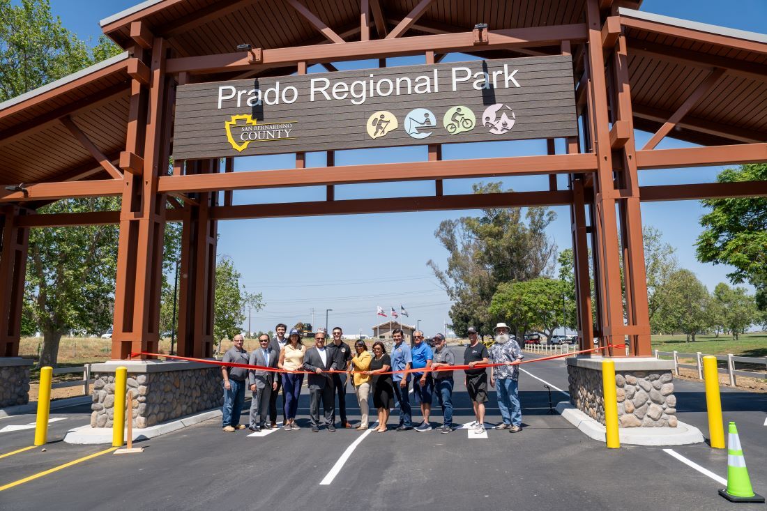 Community leaders presenting a certificate of recognition during the Prado Regional Park gatehouse ribbon-cutting ceremony.