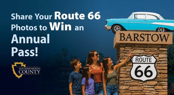 Family stands by a Barstow Route 66 sign topped with a classic car. Share Your Route 66 Photos to Win an Annual Pass! County logo shown.