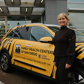 woman with United Healthcare car