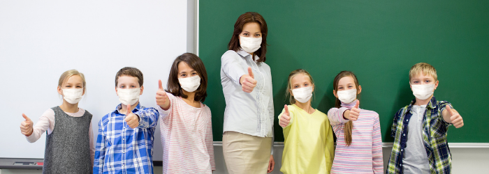 Teacher and Students in Masks
