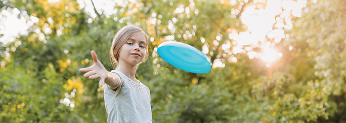 Girl Throwing Frisbee