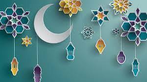 Ramadan decorations against a green wall