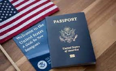 Stock photo of U.S. passport and American flag